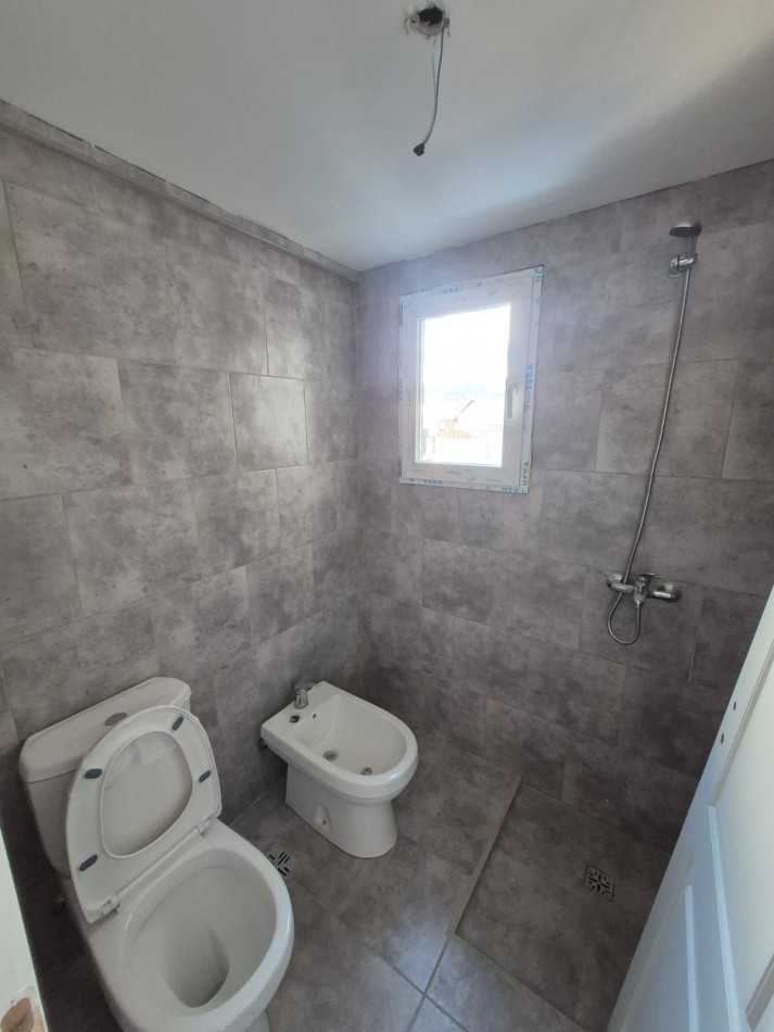 Departamento mas cochera