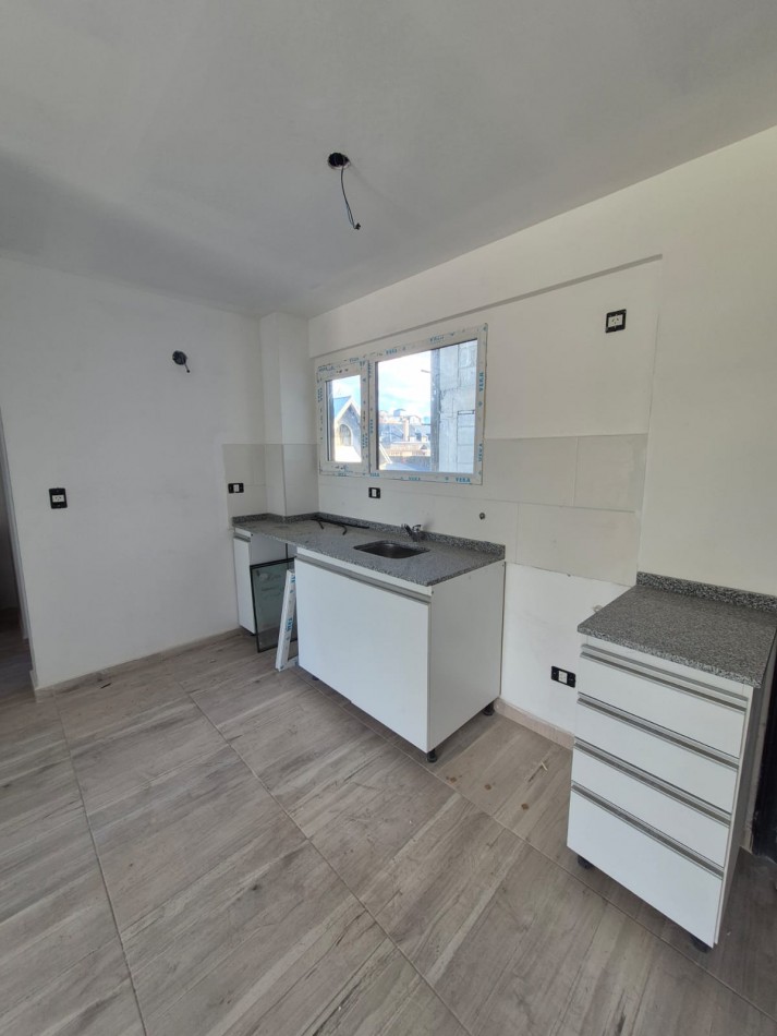 Departamento mas cochera